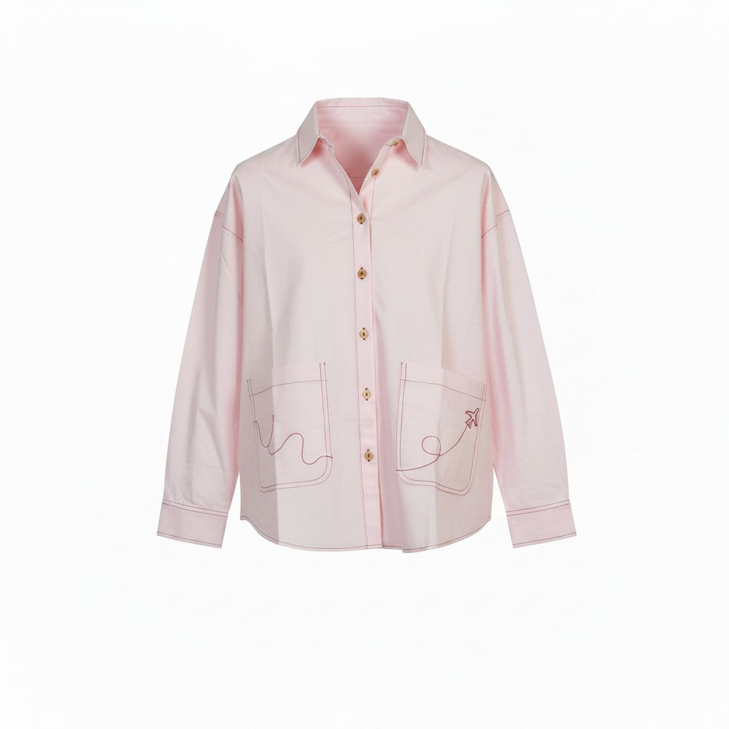 Pink oversized travel shirt with airplane embroidery on front patch pockets