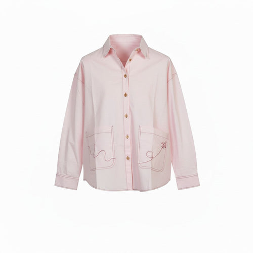 Pink oversized travel shirt with airplane embroidery on front patch pockets